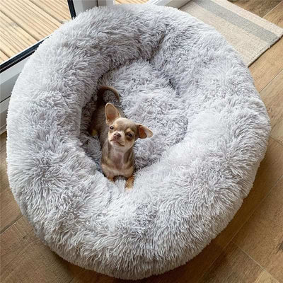Plush ultimate comfort dog bed, ultra-soft and washable for cozy snuggles.